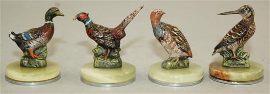 A set of four cold painted bronze menu holders, largest 1.5in.